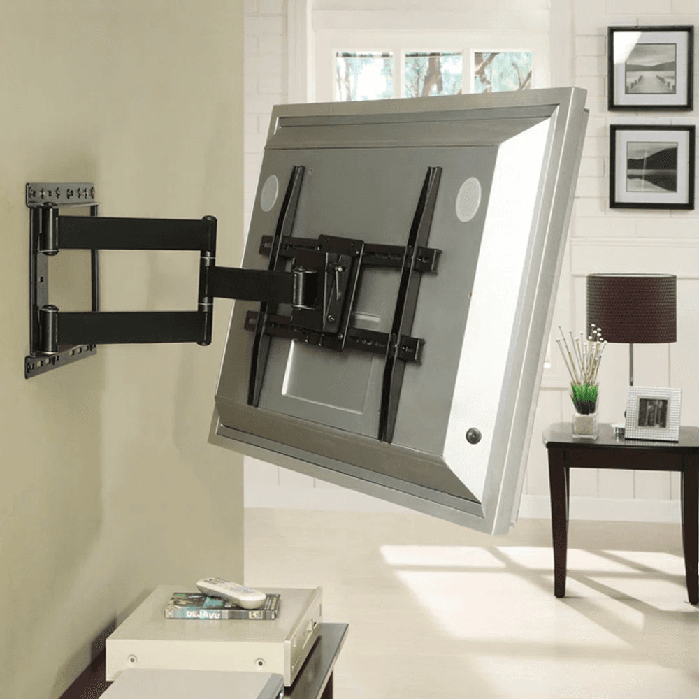 A TV swung out from the wall on an extended full-motion mount arm in a living room.